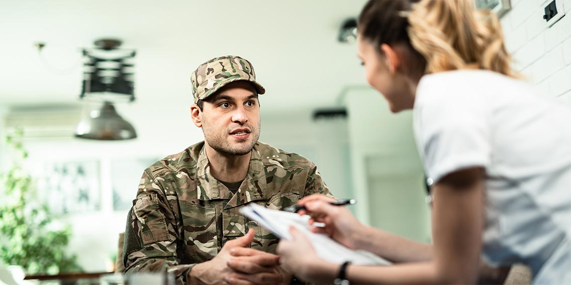 Service member discussing refinancing a mortgage.