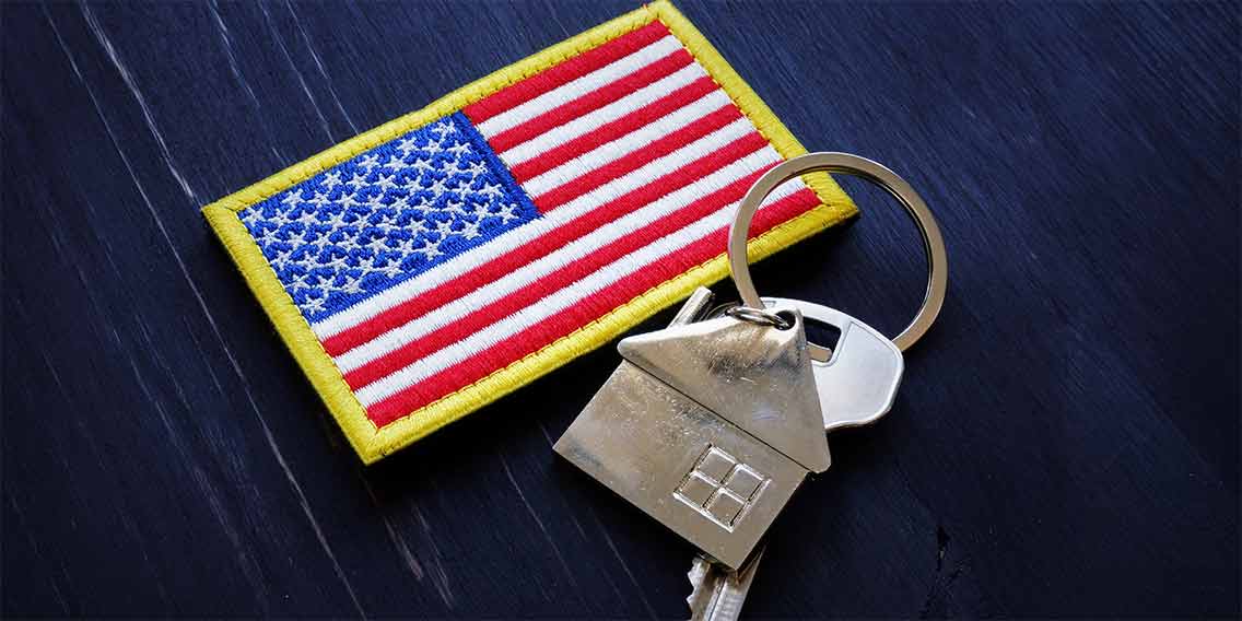 American flag with keys to home