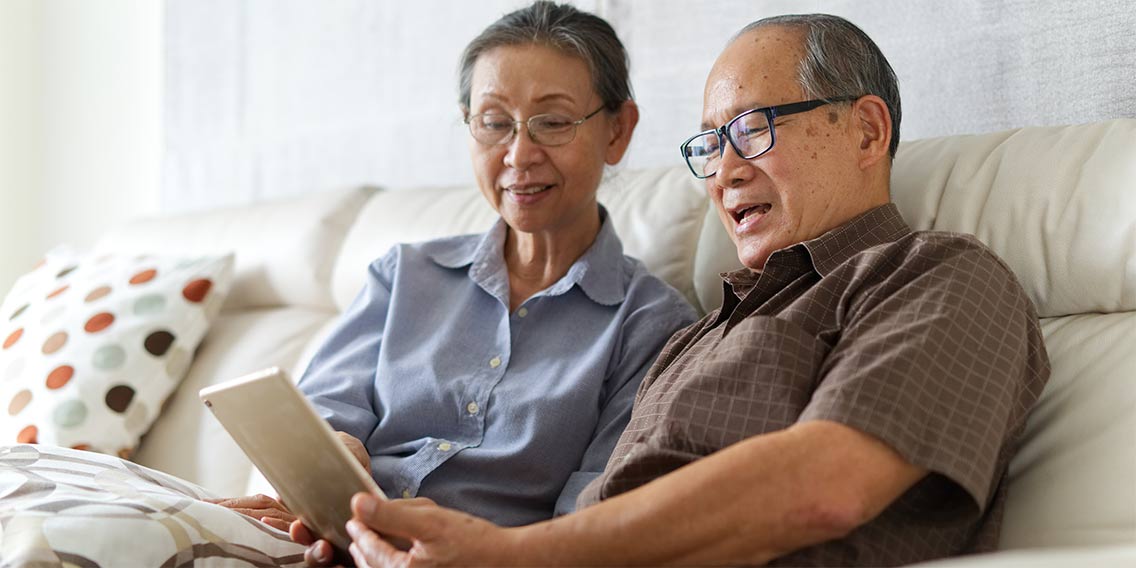 older couple looking at 401k