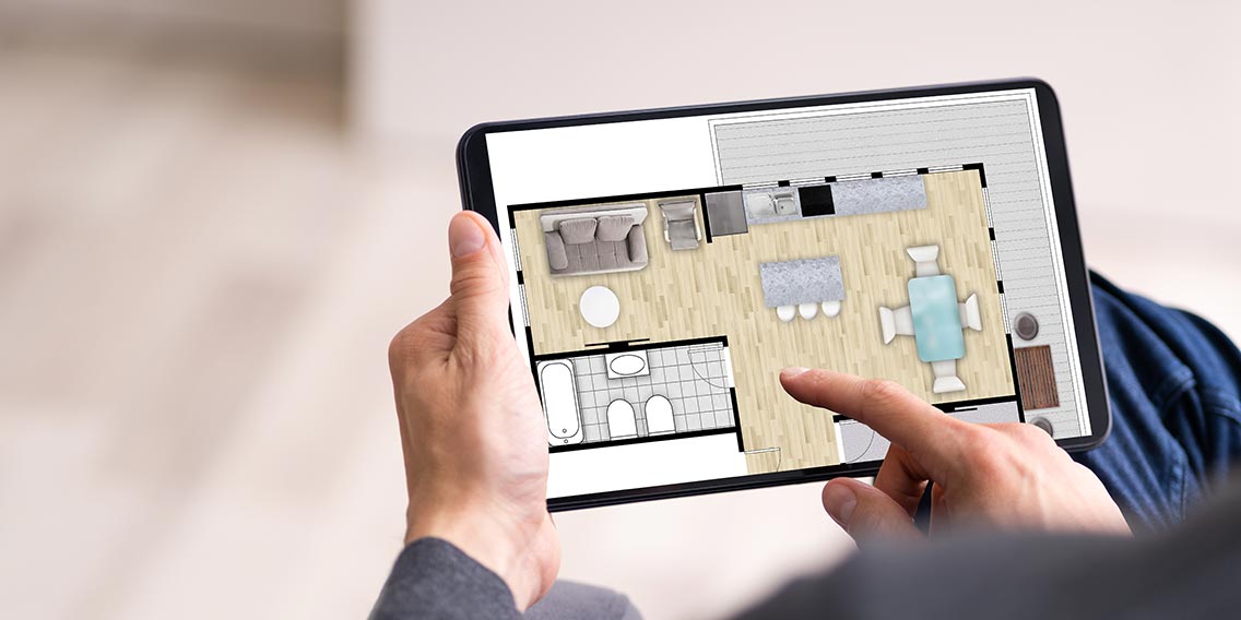 Someone on tablet looking at home improvements.
