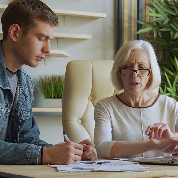 older parent discussing student loan refinancing