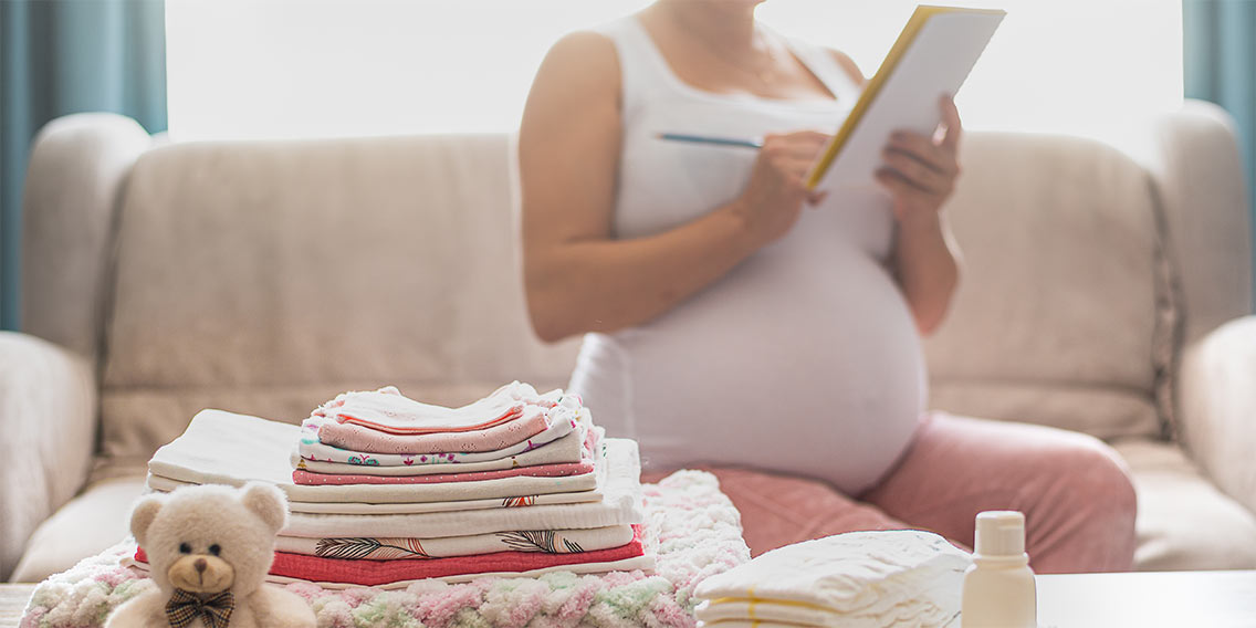 mother preparing finances for baby