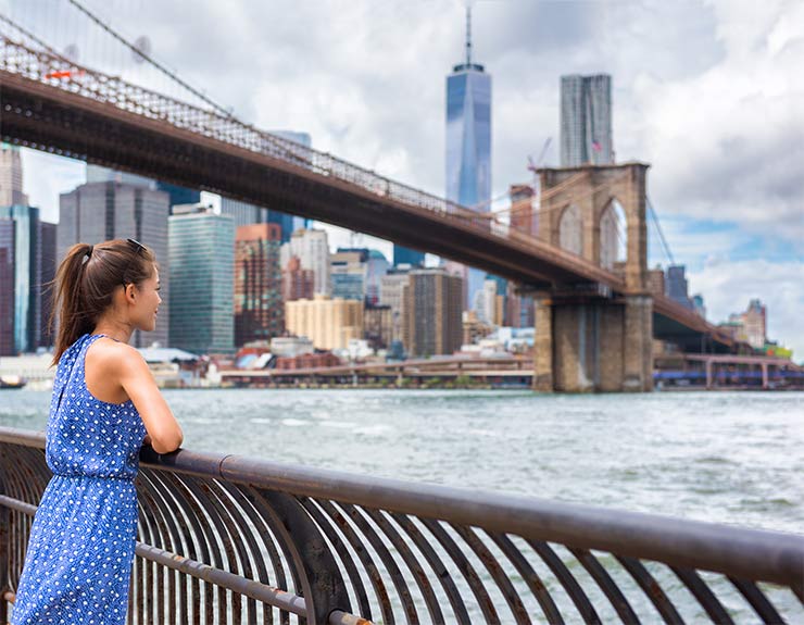 woman looking at big city