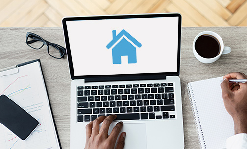 man searching for homes online