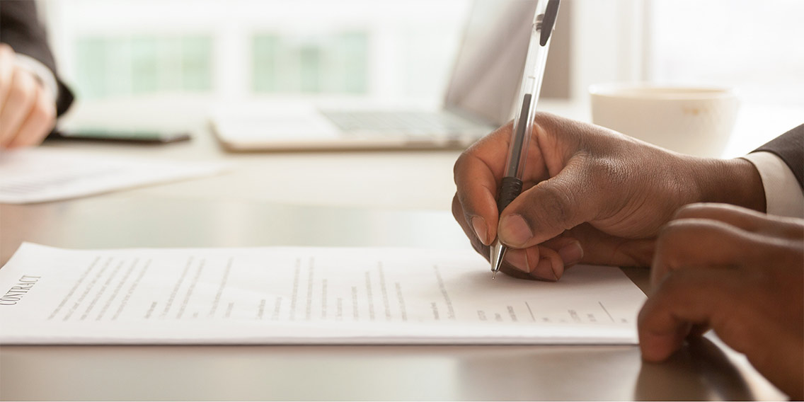 man looking at VA loan closing costs