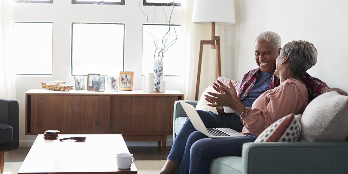 couple researching va and conventional loans