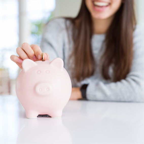 saving money in a piggy bank