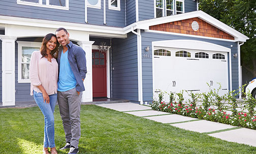 husband and wife buying a new home