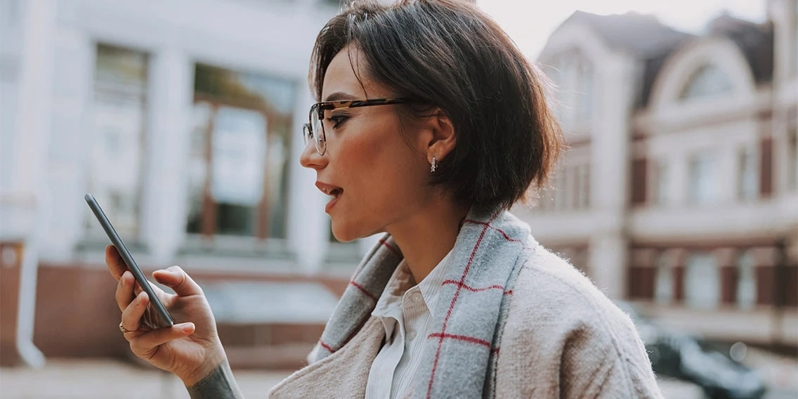 woman looking at phone
