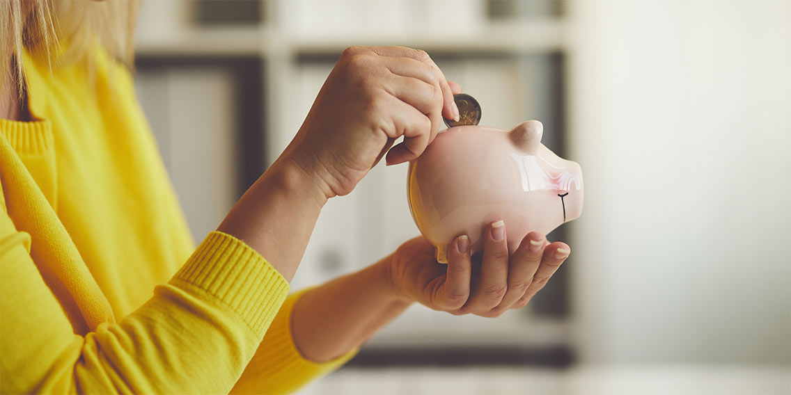 saving money in piggy bank