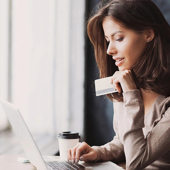 woman choosing new credit card
