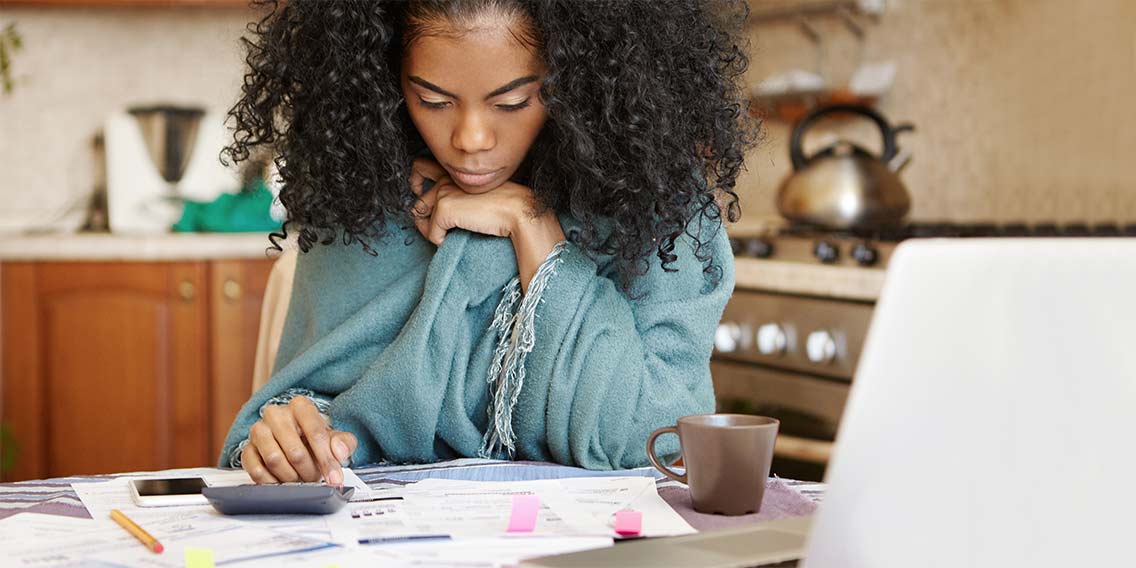 woman budgeting and managing debt