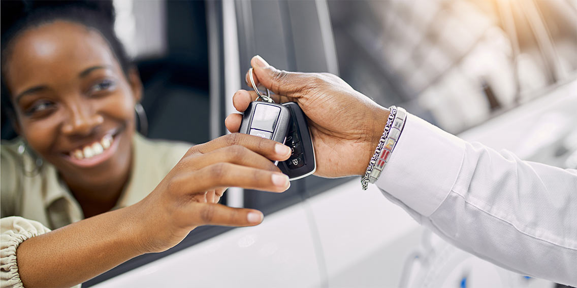 woman getting car keys