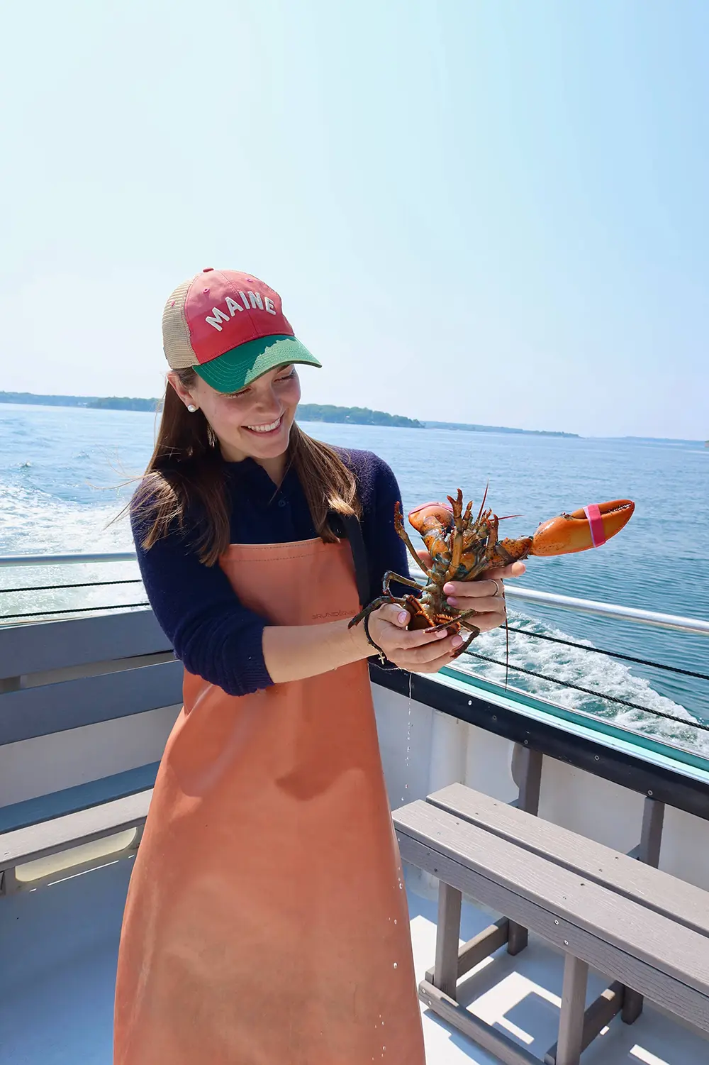 Sam Schlageter holding a lobster