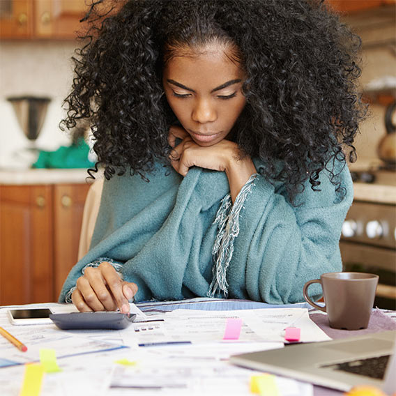 woman budgeting and managing debt