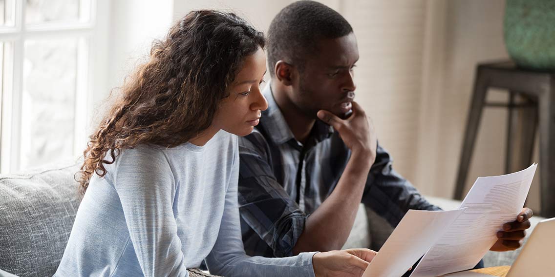 Couple looking over documents