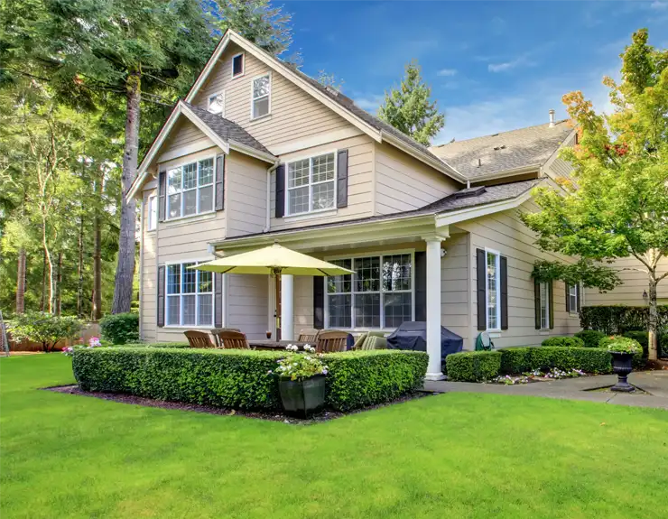 Dollar bills in glass jar on wooden background. Saving money concept.