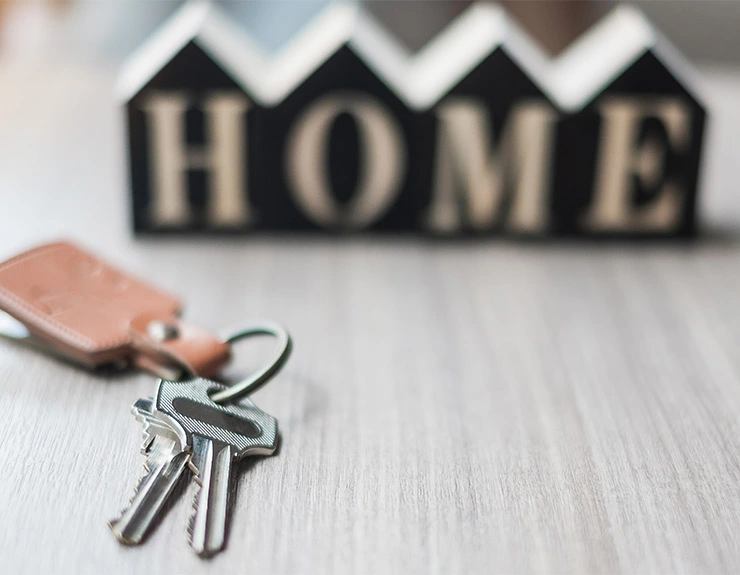 Woman on phone with moving boxes