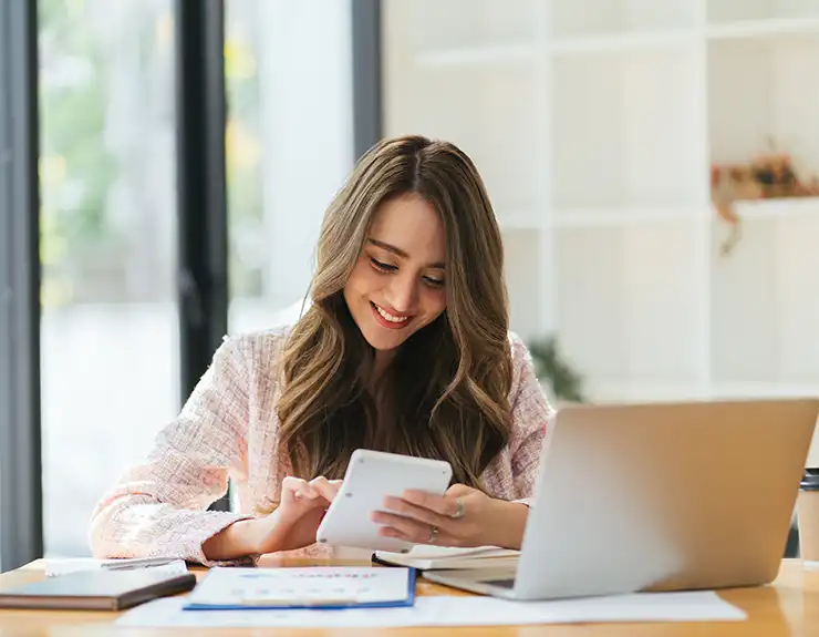 woman using calculator