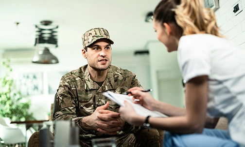 service member discussing refinancing a mortgage