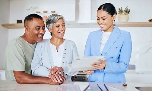 a woman painting her interior home wall blue