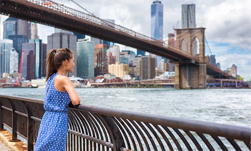 woman looking at big city