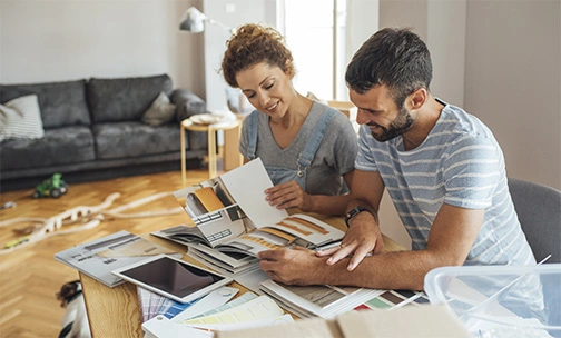 couple looking at tablet