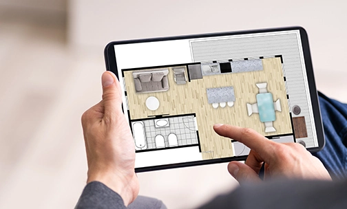 Someone on tablet looking at home improvements.