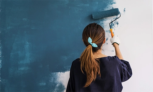couple discussing home renovations and paint colors
