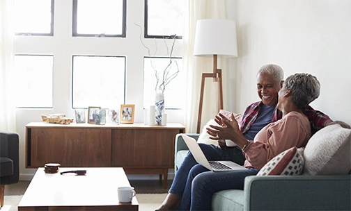 couple researching va and conventional loans