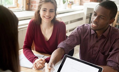 Couple discussing buying a home