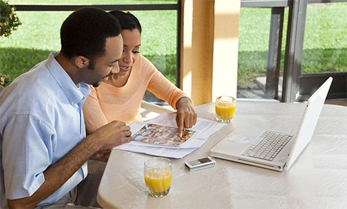 couple looking at buying house