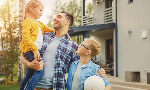 a woman painting her interior home wall blue
