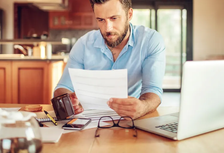 man reading document
