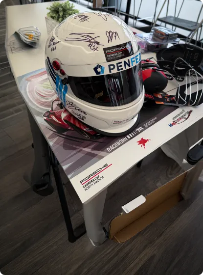 Honoring a Hero at road with signed PenFed sponsored racing helmet