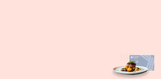 PenFed Platinum Rewards Visa Card next to a dinner plate