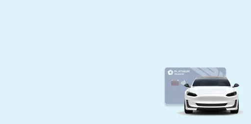 Car with PenFed Platinum Rewards Visa Signature card in the background