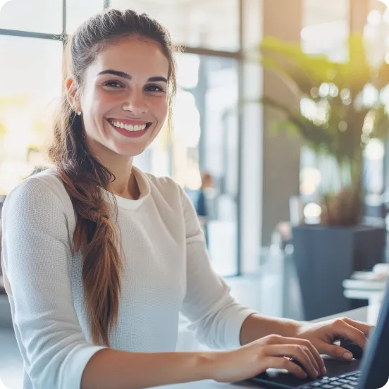 Women with her laptop smiling