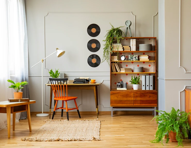 living room with records on the wall