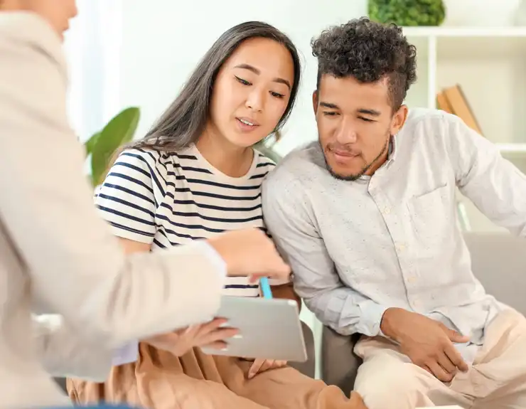 couple looking at tablet