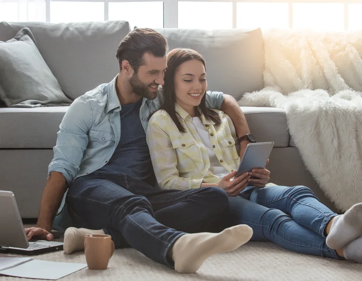 couple looking at tablet