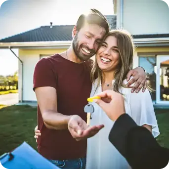 A couple receiving a key