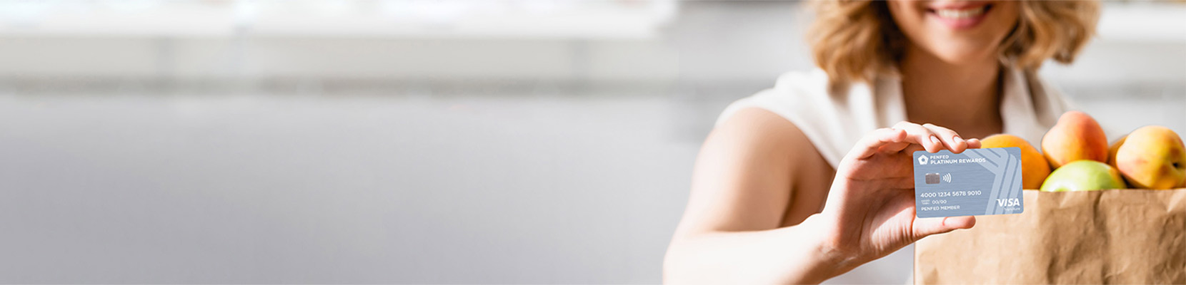 Woman holding card