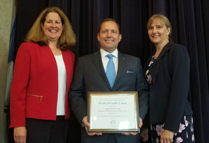 James Schenck, pictured with Alexandria, Virginia Mayor Allison Silberberg (left), accepts the 2018 Large Business Philanthropist of the Year Award from Volunteer Alexandria Executive Director Marion Brunken (right). Photo courtesy of Lucelle O’Flaherty. 