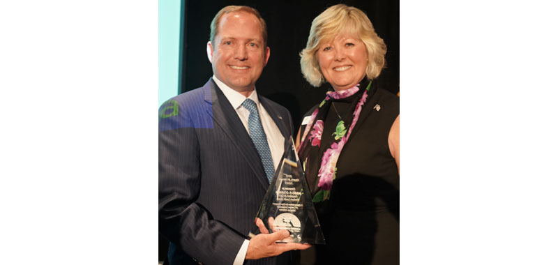 James Schenck receiving the Hearts & Hero award from Dana Perino at CCI.