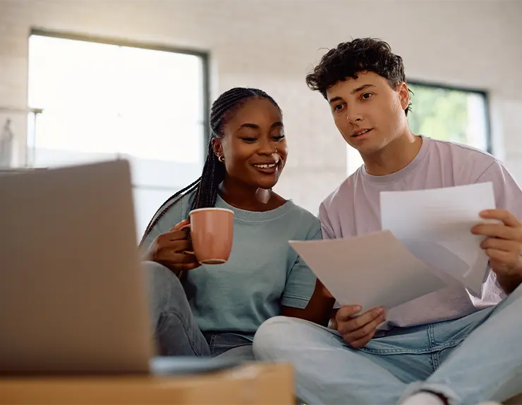 happy couple doing research