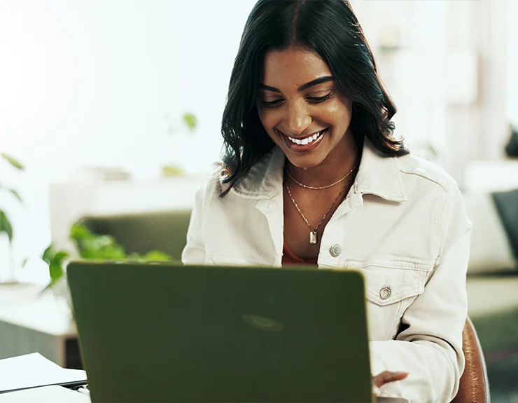 woman doing research on her computer