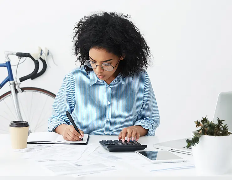 woman using a calculator