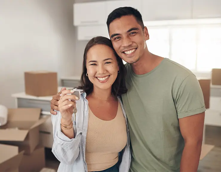 happy couple moving into their new home