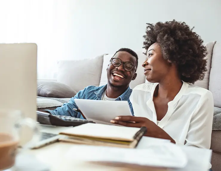 happy couple doing research